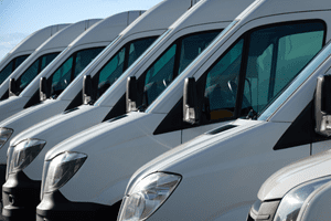 fleet of white commercial vans